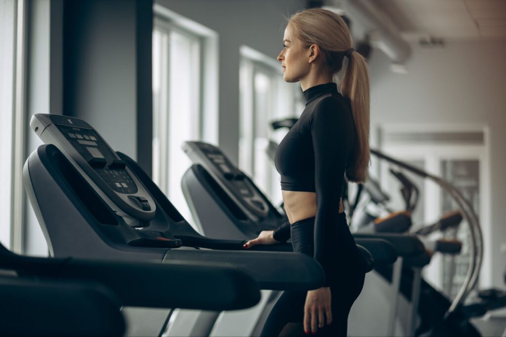 A woman working out on a treadmill